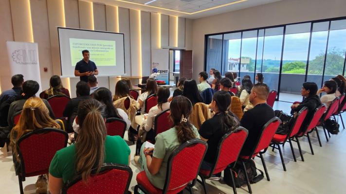 Man speaking to a workshop group