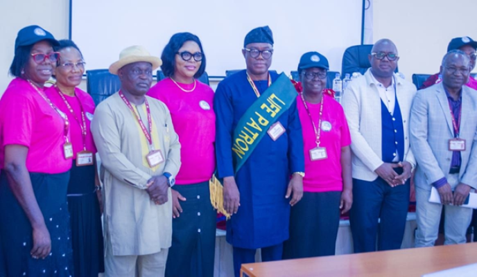 Decoration of Ekiti State University Vice Chancellor, Prof Joseph Babatola Ayodele as a life Patron of OWSD, EKSU branch
