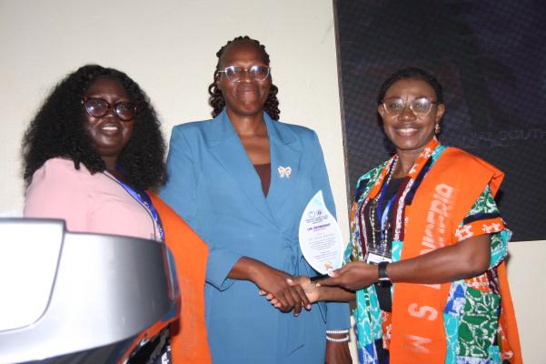 Prof. Abimbola Adebisi Baale, Former Vice Chancellor, Westland University, Iwo, Osun State  being given the Life Membership award
