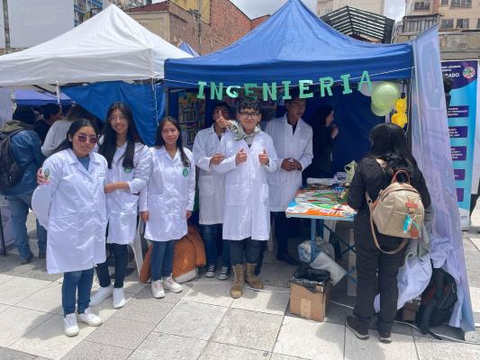 Young women attend a science fair in La Paz