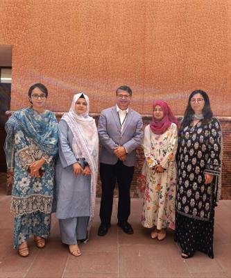 group photo with AKU dean