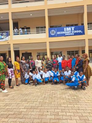 Members of OWSD IMT celebrating the IDWGIS with the students