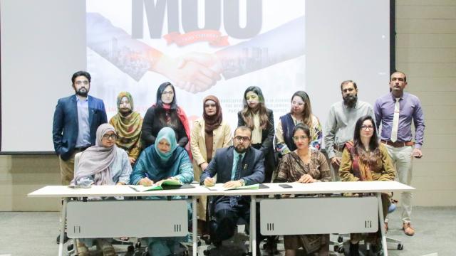 signing of MoU by committee members