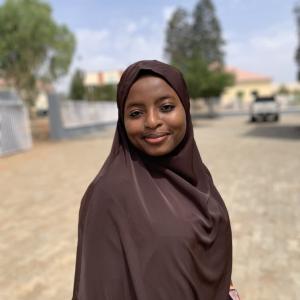 A brown hijab and a clean background 