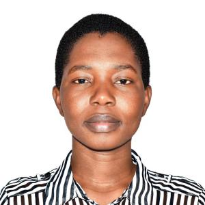 Mary Atieno Ouma, Kenyan livestock scientist specializing in animal nutrition and livestock genetics, photographed in a professional headshot.