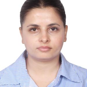 Professional headshot of Medhavi Dhakal