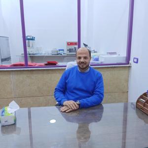 Professional portrait of Dr. Fathallah Abd El-Maksood Fathallah Ayoob.