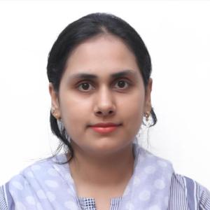 Professional portrait of a female chemical engineer specializing in sustainable energy and environmental research.