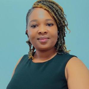 Portrait of a woman scientist with a background in biochemistry, molecular biology, and medical entomology.