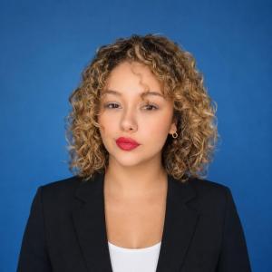 Professional headshot of Mirka Morales, cybersecurity and technology business professional.