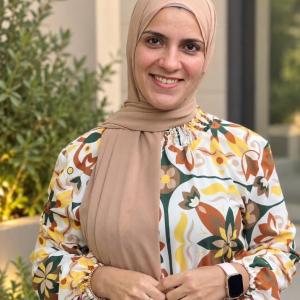Professional headshot of Dr. Abrar Gomaa, Lecturer of Biochemistry and Molecular Biology.
