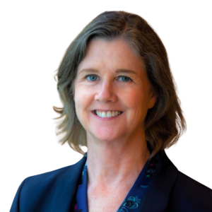 Woman with light brown hair just above shoulder length, wearing a navy blue suit.