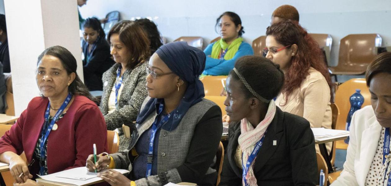 Women in a higher education classroom setting