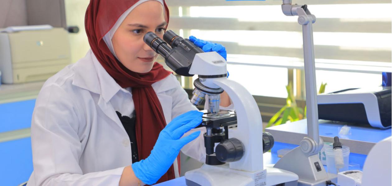 Woman using scientific equipment 