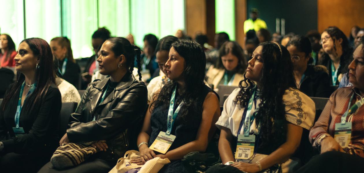 Audience listen at a conference